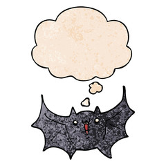 cartoon happy vampire bat and thought bubble in grunge texture pattern style