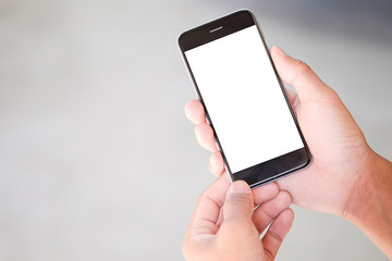  Cropped shot view of man hands holding smart phone with blank copy space screen for your text message or information content, female reading text message on cell telephone during in urban setting. 