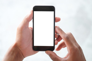  Cropped shot view of man hands holding smart phone with blank copy space screen for your text message or information content, female reading text message on cell telephone during in urban setting. 