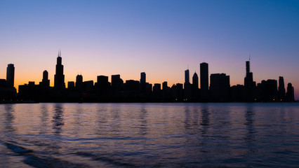 Fototapeta na wymiar The skyline of Chicago at sunset - CHICAGO, ILLINOIS - JUNE 12, 2019