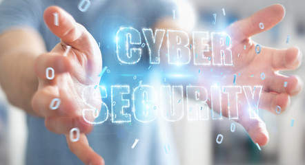 Businessman using cyber security text hologram 3D rendering