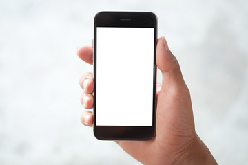 Cropped shot view of man hands holding smart phone with blank copy space screen for your text message or information content, female reading text message on cell telephone during in urban setting. 