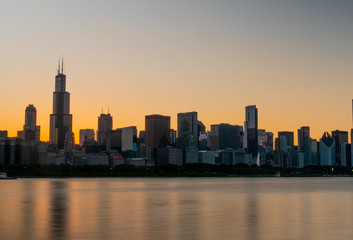 Fototapeta na wymiar Silhouette of Chicago skyline in the evening - CHICAGO, ILLINOIS - JUNE 12, 2019