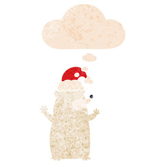 cute cartoon christmas bear and thought bubble in retro textured style