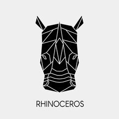 Geometric rhinoceros. Polygonal head of animal. Black silhouette. Vector illustration.	