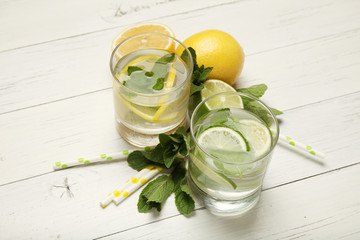 Fresh detox lemon water, healthy drink. Summer citrus lemonade.