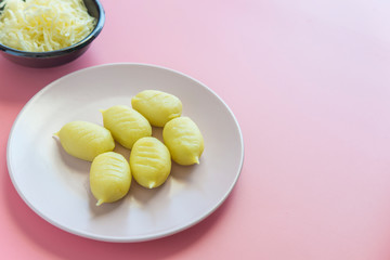 gnocchi stuffed with pesto with homemade tomato sauce and cheese