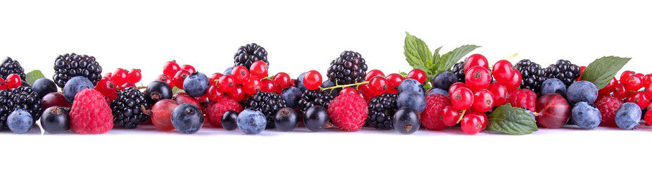 Tasty berries, currants, blackberries, blueberries, raspberries on a white isolated background