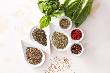 Many different spices on light background