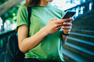 Young woman wearing green t-shirt