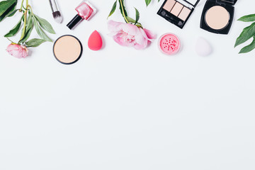 Overhead view composition of makeup products