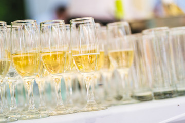A cocktail party with champagne glasses 