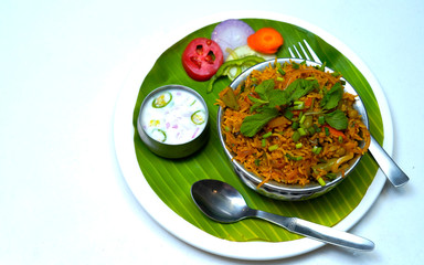 Vegetable biriyani with onion raitha