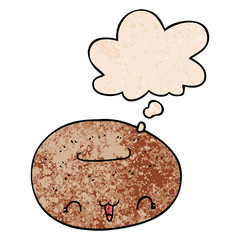 cute cartoon donut and thought bubble in grunge texture pattern style