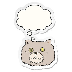 cartoon cat face and thought bubble as a printed sticker