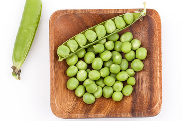 fresh pea pods isolated on white background.