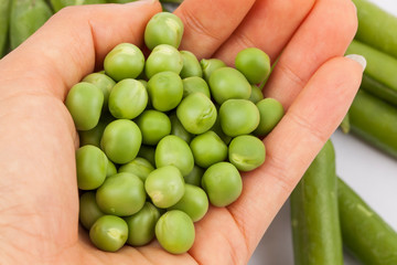 fresh pea pods isolated on white background.