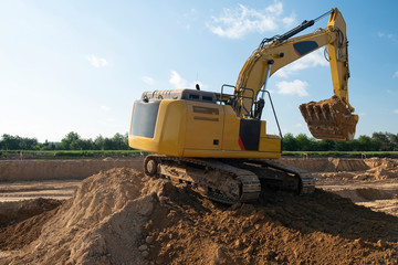 excavator on construction of new highway