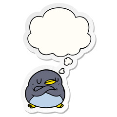 cartoon penguin and thought bubble as a printed sticker