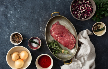 Raw steak with ingredients for cooking healthy food top view