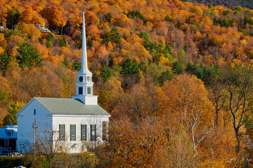 Iconic New England church in Stowe town at autumn in Vermont, USA