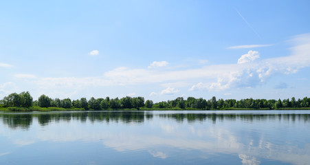 Beautiful view of the lake in nature. Summer landscape.