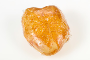 Smoked chicken breast over white background