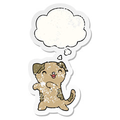 cute cartoon puppy and thought bubble as a distressed worn sticker