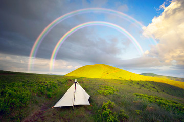 ultralight white tent in the mountains