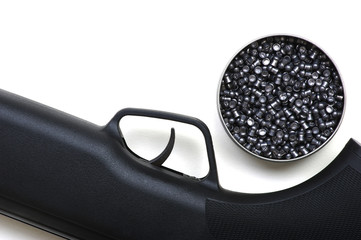 Black air rifle gun on a white