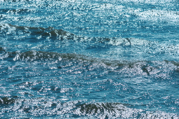 Blue and foamy Baltic sea water.