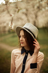 fotography of a girl in nature. Blooming trees. Apricots