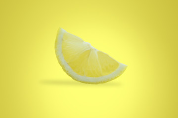 lemon with slice isolated on colour background. healthy food