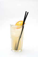 lemonade with a slice of dried orange in a transparent glass on a white background