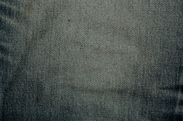Fototapeta na wymiar Irregular color background, denim pattern at close range