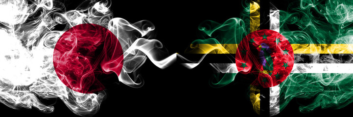 Japan vs Dominica smoky mystic flags placed side by side. Thick colored silky smokes combination of Dominica and Japanese flag