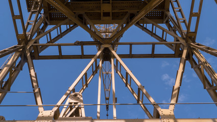 Abstract picture of a dockside crane from underneath