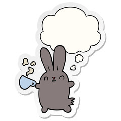 cute cartoon rabbit with coffee cup and thought bubble as a printed sticker