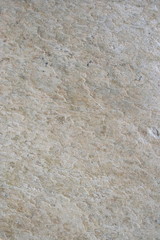A surface of a architectural stone.(white, gray, pink, brown and black.rough)