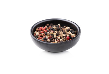 pepper in bowl on isolated white background