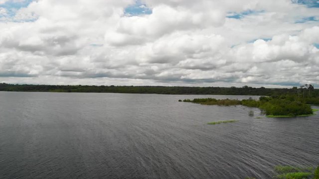 rising drone shot flying over the rio negro in the state of amazoni in brazil.