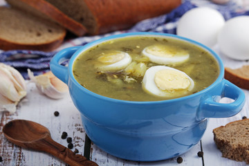 A bowl with homemade sorrel soup