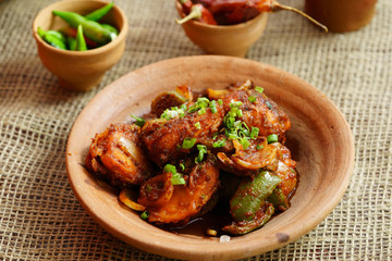 Chilli egg or Spicy cottage cheese, served with capsicum and onion, favourite indian starter menu