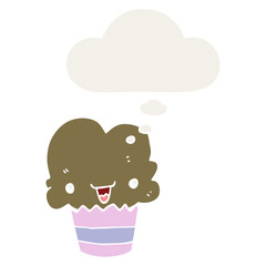 cartoon cupcake with face and thought bubble in retro style