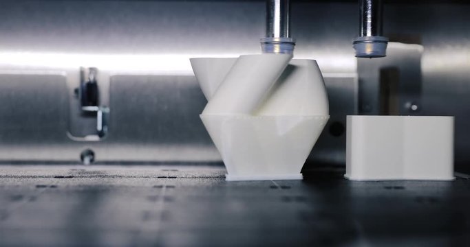 3d printer at work. Printing bulk items. Technologies of the future.
