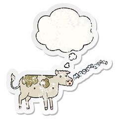cartoon cow and thought bubble as a distressed worn sticker