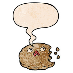 cartoon bitten cookie and speech bubble in retro texture style