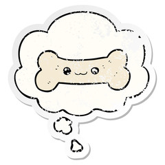 cartoon bone and thought bubble as a distressed worn sticker