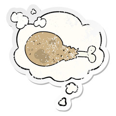 cartoon cooked chicken leg and thought bubble as a distressed worn sticker