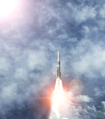 Rocket and clouds. Taking off from ground, lift off. The elements of this image furnished by NASA.